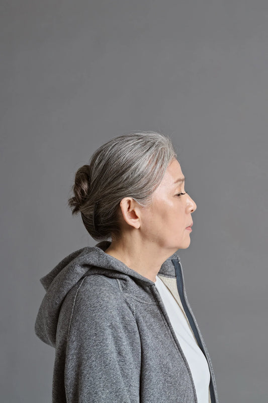 kitt Japanese Zip Hoodie in Heather Grey - worn by model side profile