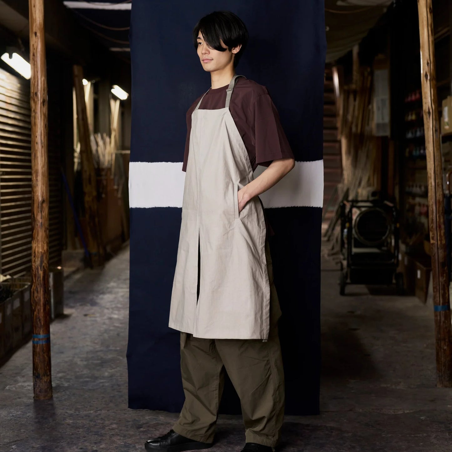 MAKU Japanese cotton apron in Suzu (Pewter Grey) - worn in workshop